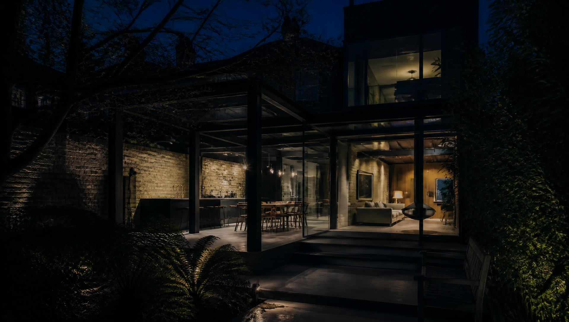 Completed modern residential extension lit at night